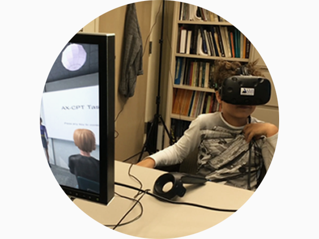 Child testing virtual reality, autism and technology