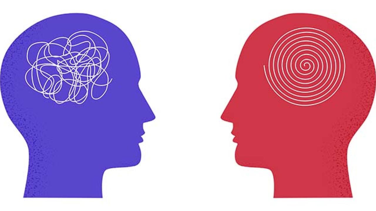 Two human heads facing each other