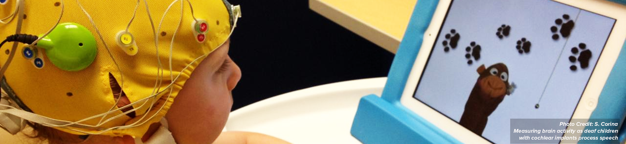 Measuring brain activity as deaf children with cochlear implants process speech